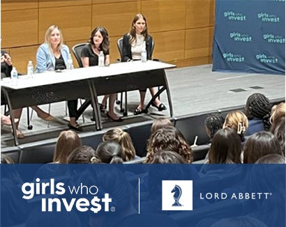 Women Listening to Panel Discussion